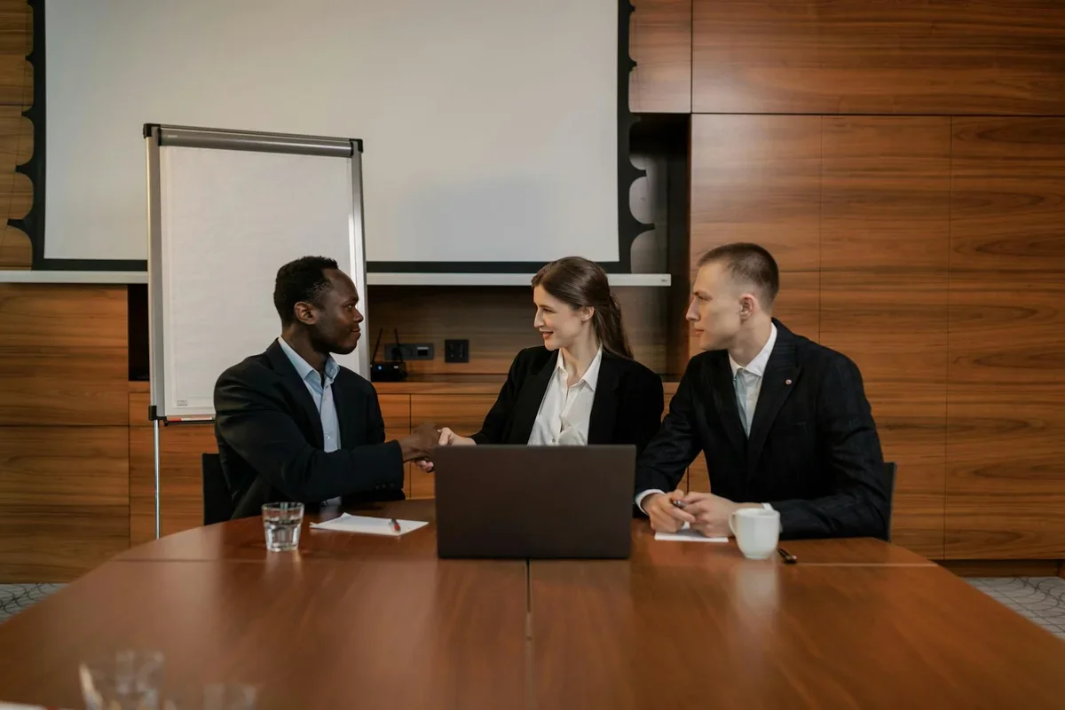 Professional handshake after successful salary negotiation